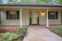 LONG COVERED Front Porch w/ Barely a Step to get Inside!!!