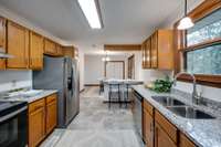 OPEN CONCEPT Kitchen w/
UPGRADED Appliance Package including Refrigerator