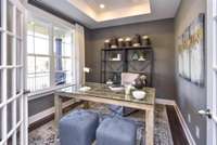 Hide away in this flex room located in the front of the house. Did I mention the French doors are included? Photo not of actual home.