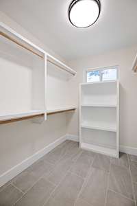 Primary closet with built-in shelving