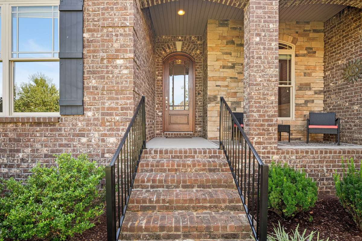 Discover your exceptional luxury home in The Reserve, Murfreesboro 's prestigious all brick community. First impression is intricate stone and mason work. The stately entryway, reflects the quality found in the entire house. Welcome.