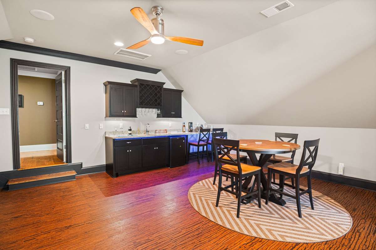 Beyond its impressive scale, this media/game room serves as a versatile sanctuary for every mood. With ample space and precise sound control, it's the ideal setting for cinematic dreams or thrilling game night conquests.