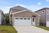 In addition to the 2-car garage, there is private driveway parking