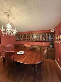 AND JUST LOOK AT THIS DINING ROOM - SPACIOUS & HAS LOTS OF CABINETS FOR YOUR CHINA.