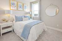 Guest bedroom with walk-in closet upstairs.