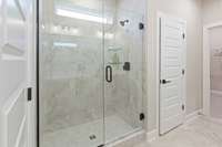 Enjoy luxury every day in your primary suite! Double vanities, ceramic tile, and raised height vanities are included. Choose between a separate tub and tiled walk-in shower or tiled walk-in shower with linen closet at NO COST!