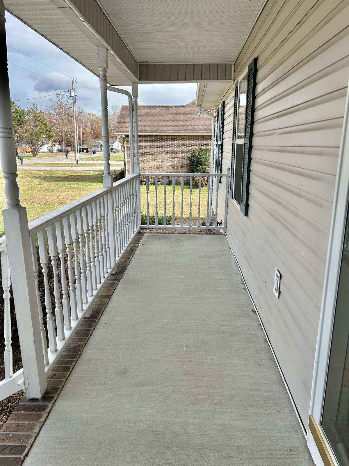 This home has a great covered front porch!!