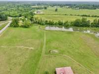 Home is surrounded by pasture and hayfields.