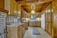 PERFECT River Home Kitchen!
CUSTOM Wood Cabinetry + Floor to Ceiling Pantry