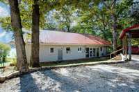 Renovated + Loaded w/ UPGRADES
Covered Carport + Separate Storage Building