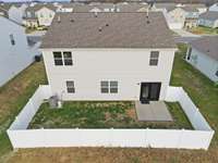 Privacy fenced backyard overlooking field - no rear neighbors!