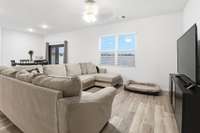 Private backyard view with field behind - newly installed French Doors lead out to a patio.