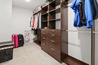 Huge walk in closet in Primary Bedroom feautring Custom Closet / Drawers / Storage