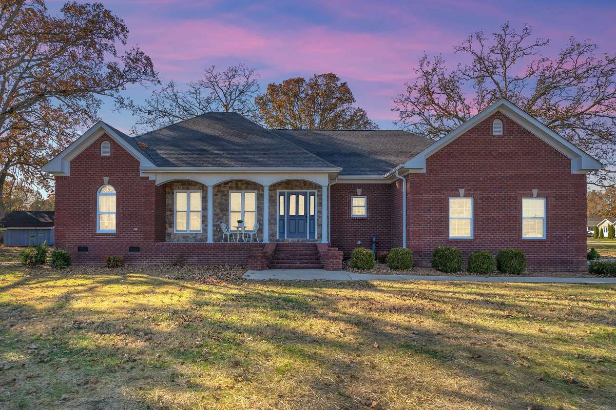 The sunrise can be enjoyed from the front porch and the sunset from the back screened patio.
