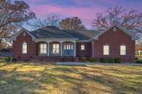 The sunrise can be enjoyed from the front porch and the sunset from the back screened patio.