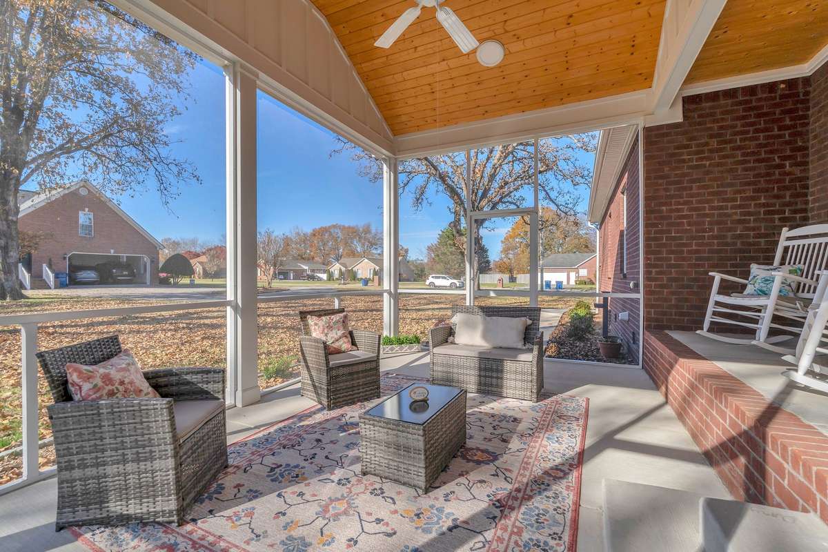 The screened patio has been recently constructed and adjoins the covered back porch.