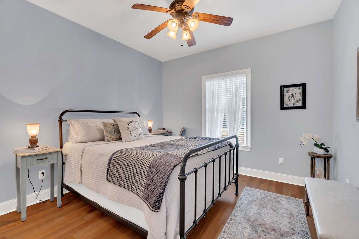 The third bedroom has a new ceiling fan, new flooring and window overlooking the backyard.
