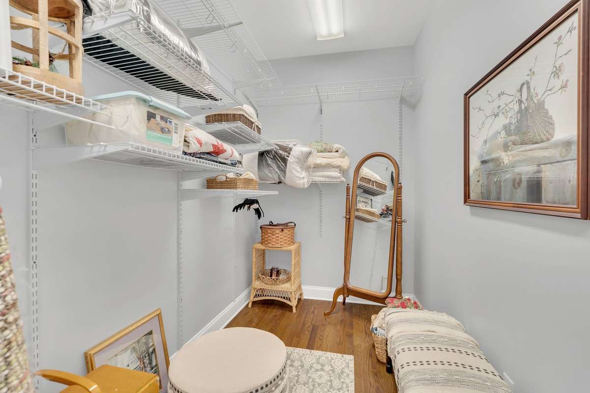 The walk-in closet runs the length of the bathroom.