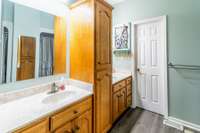 Doube vanity bathroom with another large closet inside