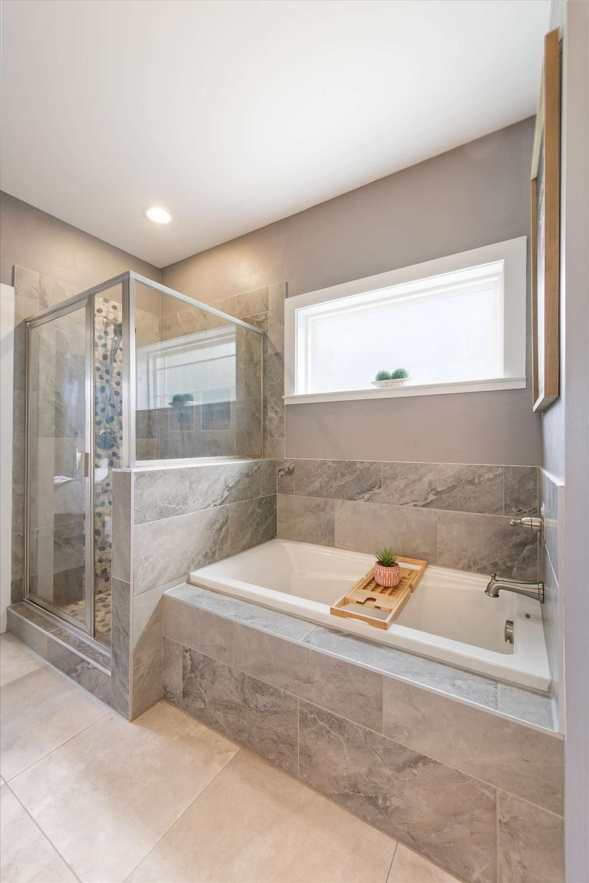 Tile floors and separate shower and soaking tub