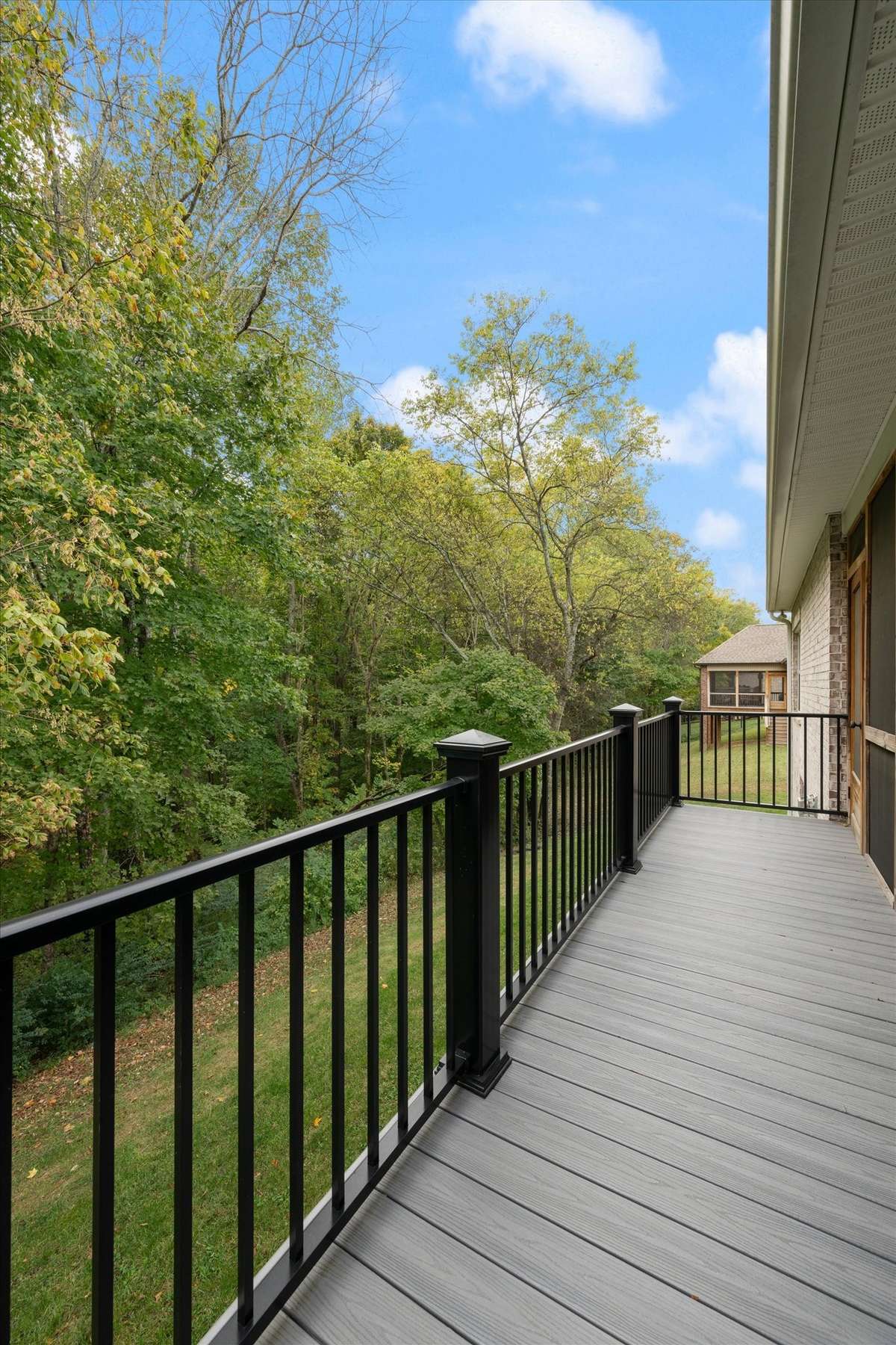 This balcony is off the deck and has room to sit and enjoy the sun or fresh air.