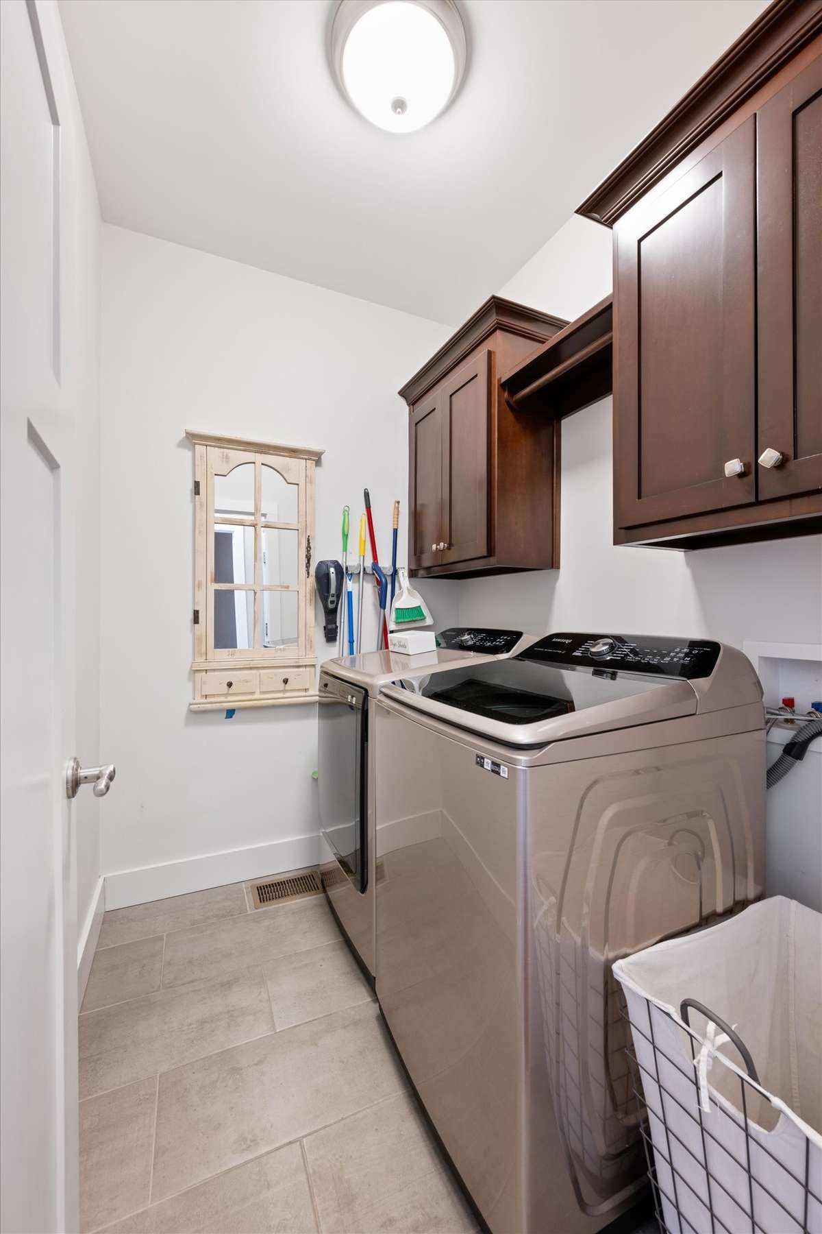 Large laundry room and storage cabinets