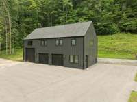 A 3-car garage provides generous parking and storage, with an expansive 1,500 sq ft flex space above—perfect for a private office, creative studio, or future guest suite.