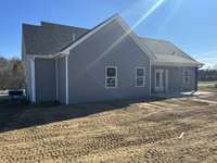 Back view with covered patio