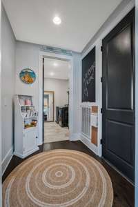 Mud room coming from  3 car garage