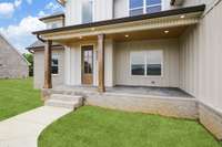 Builder will be adding Sod to the Front and Sides once weather permits, Back yard has already been seeded - This Photo was digitally edited to reflect.