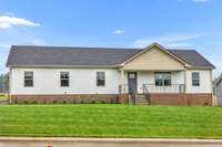 Sample pictures from a previous build showing the Carter Floor Plan.  Materials and colors are subject to change without notice.