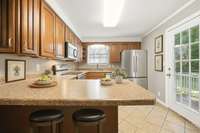 Kitchen - Virtually staged to show options for furniture placement