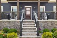 Spacious covered porches invite you to relax year round. Perfect for sipping coffee, greeting neighbors, or winding down after a day on the water.