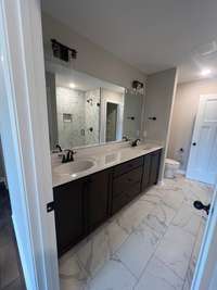 Master Bathroom with Tiled Shower