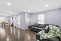 Another view of the great room and the dining area on the other side of the front door.