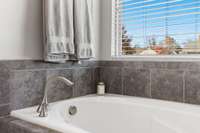 Relax and unwind at the end of a long day in this soaking tub.