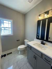 Powder Room with Custom Trim & Paint....