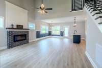 View from Front Door....Check out Electric Fireplace, Laminate Flooring & Decorative Trim,,,,