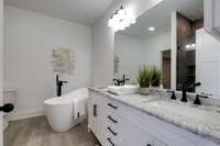 Spa Worthy Primary Bath w/ Floor to Ceiling Tile Shower
Floating Tub