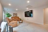 This bonus room is perfect for hanging out, a toy room, or dividing it into two spaces.