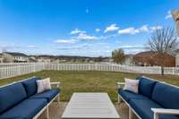 Check out this view!   Perfectly positioned on a rise in the neighborhood, you can wind down the day watching kids play while the sun sets.