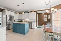Large kitchen with tile flooring