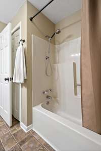 The main bathroom has a tub shower combo.