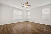 Primary Bedroom features tons of natural light!