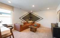 ***Photo is from a brand new Rosella Model home*** The Loft of the 2nd floor would be a great fit for those that need a secondary living space or a playroom.