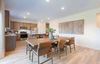 ***Photo is from a brand new Rosella Model home*** Located off the Kitchen is the Dining Room, which is designed to comfortably fit a 6 to 8 person table.