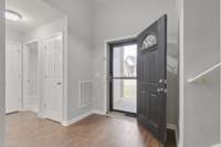 Welcome Entry: to the right is the 2 secondary bedrooms and a full bath. To the left is the stairway to the bonus room above the garage.
