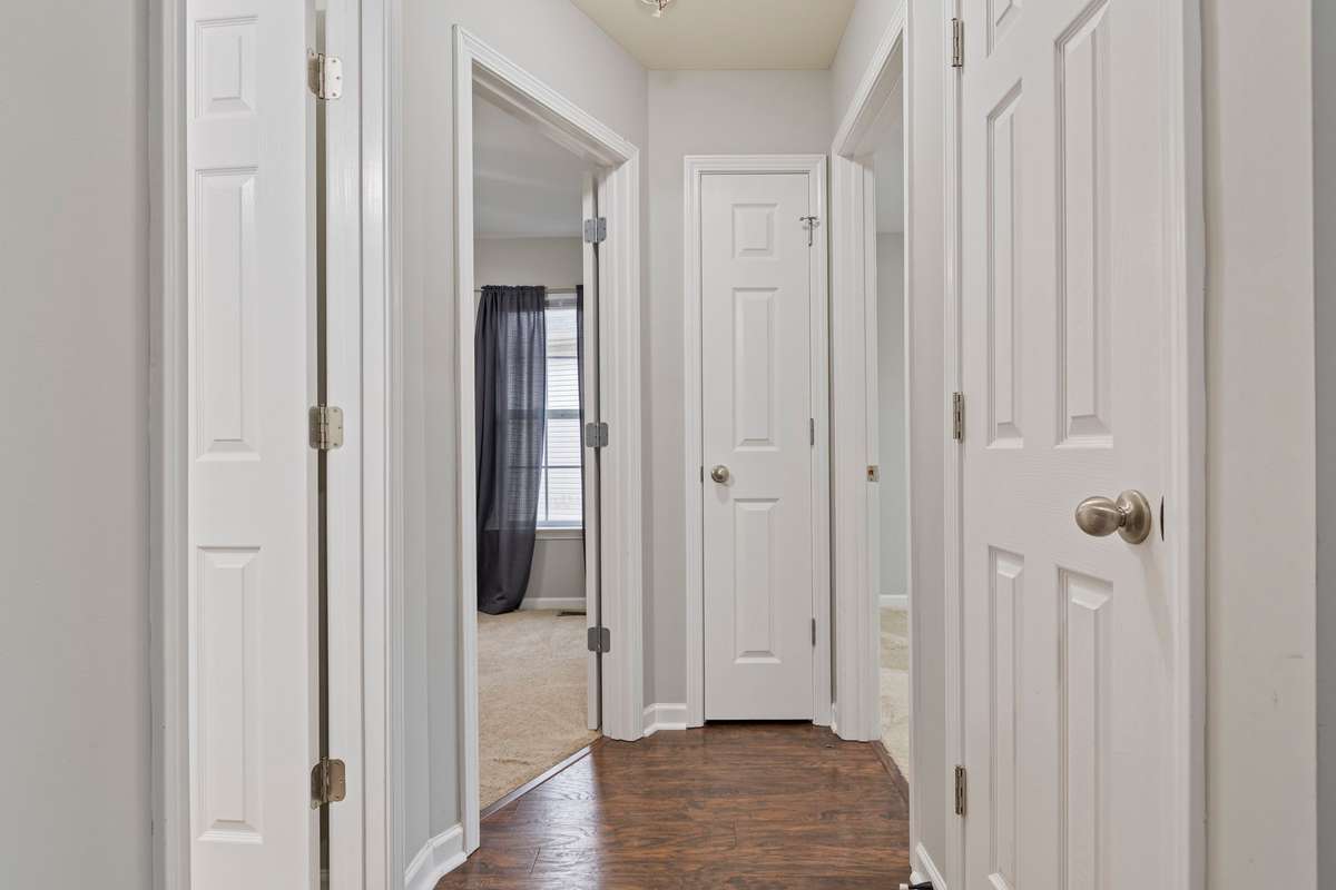 Bedroom 2 & 3: Full Bath in Hallway