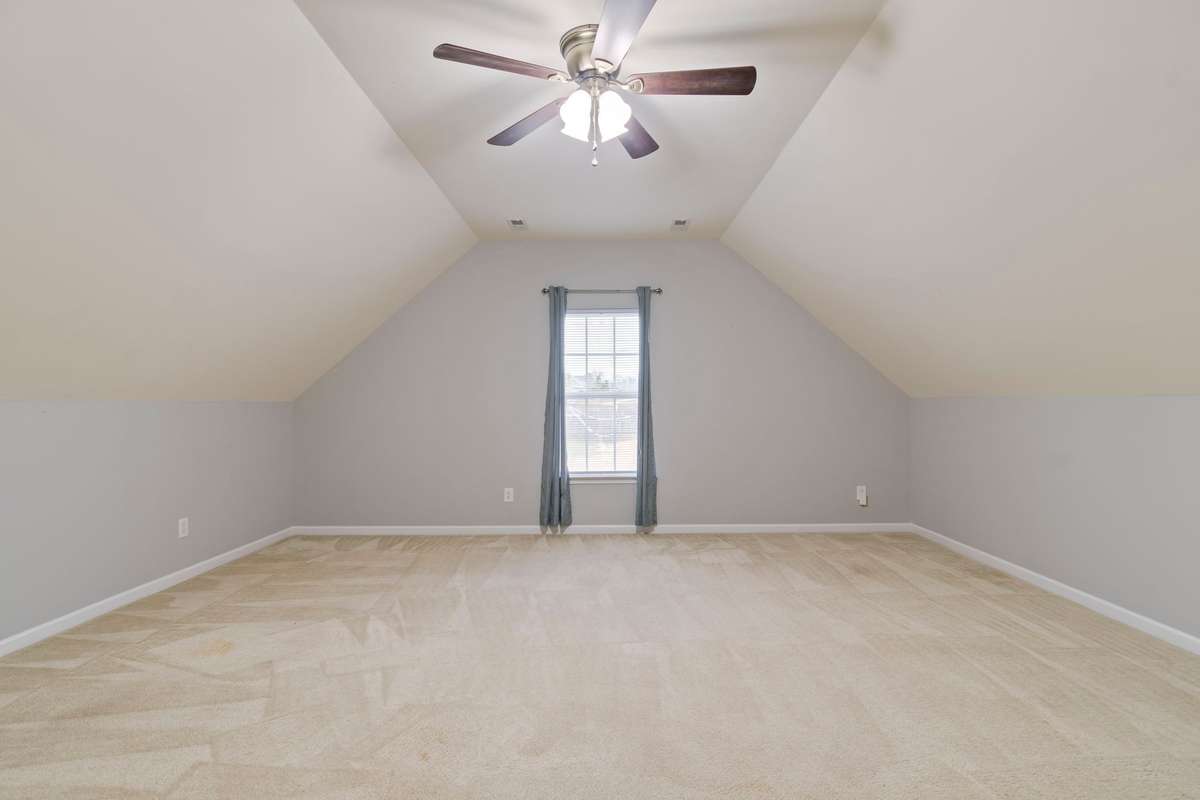 Bonus Room: Above garage with large closet and access to attic