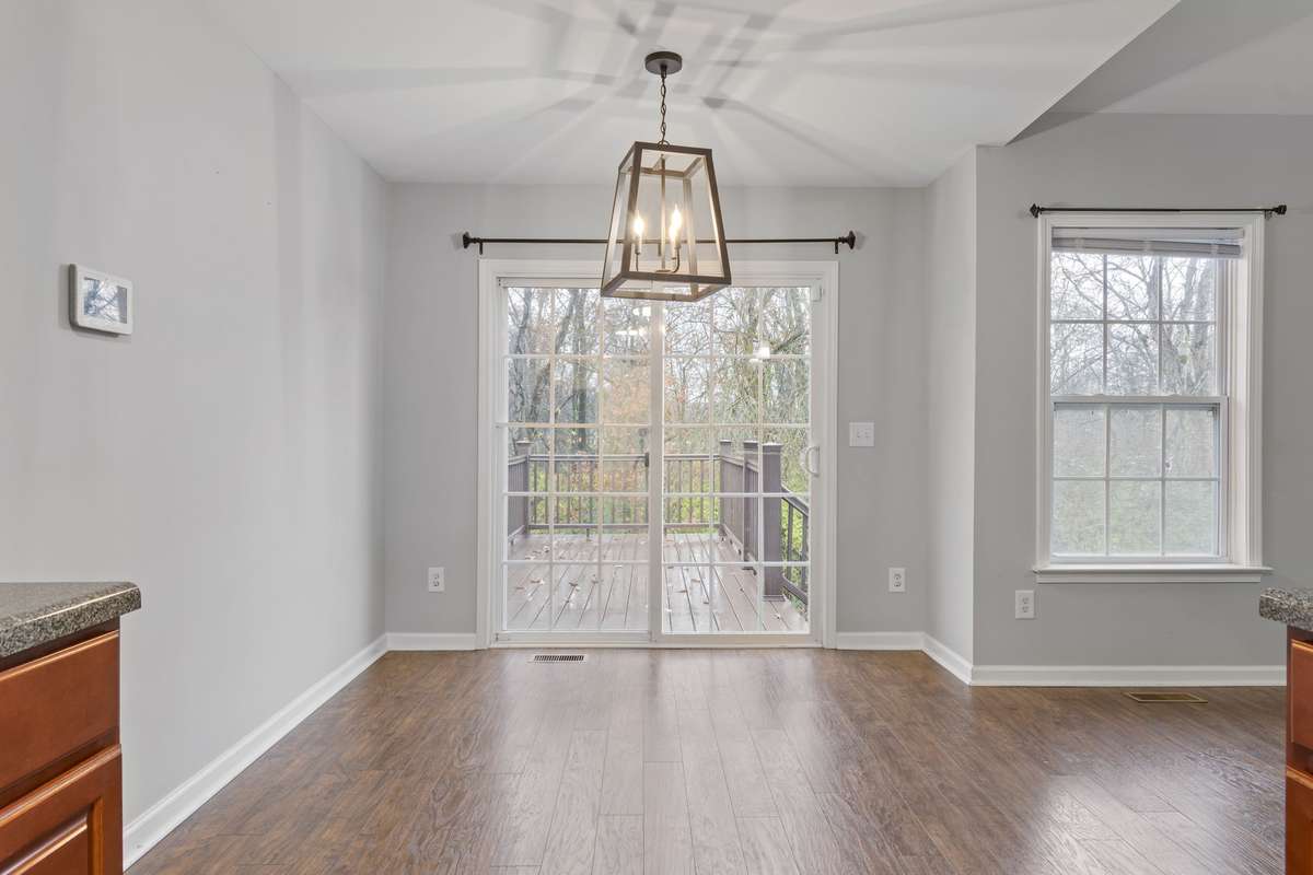 Combination Dining Area: access to Trex deck and backyard